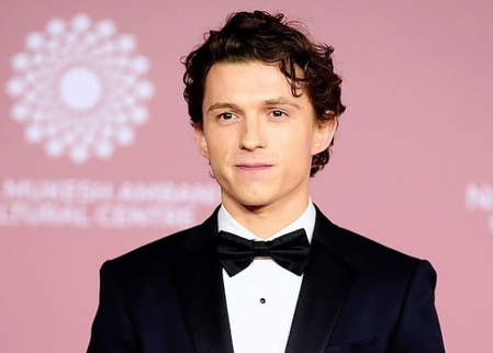 Tom Holland takes Lionel Messi on web